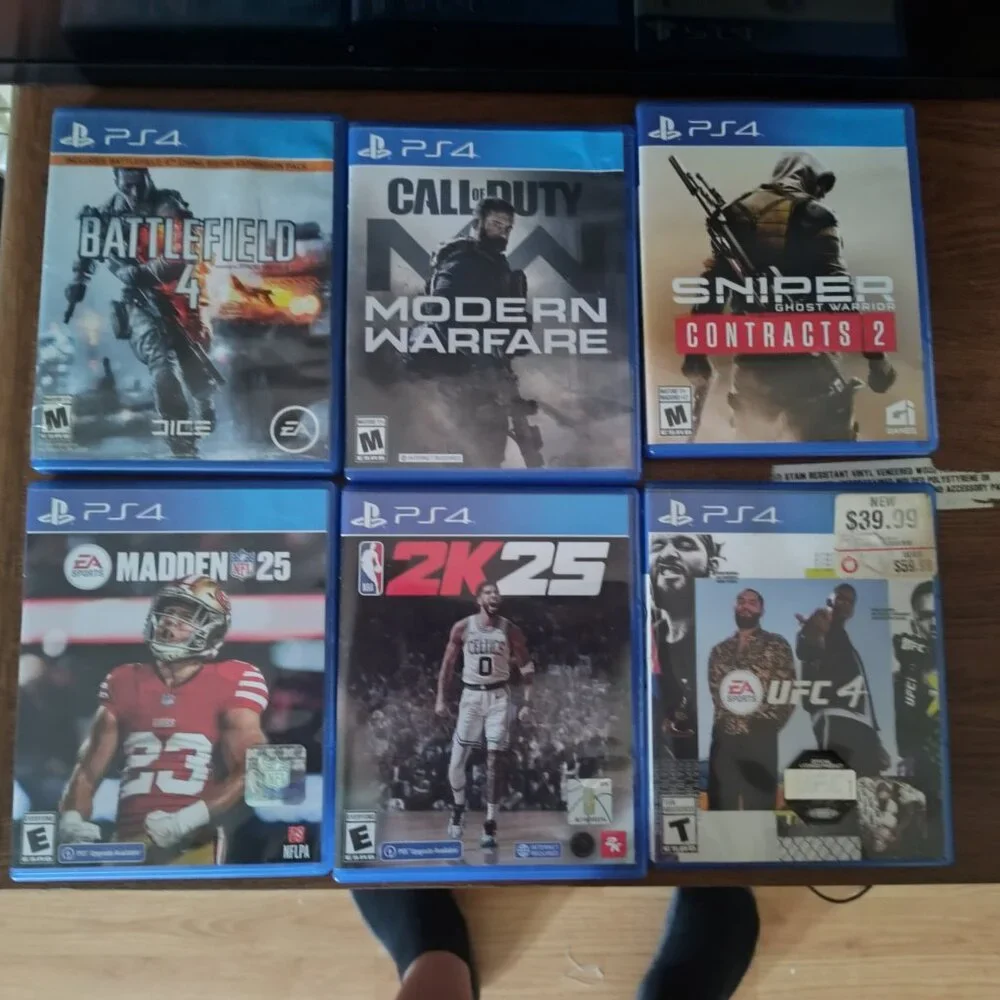 PS4 with 2 controllers and 6 games